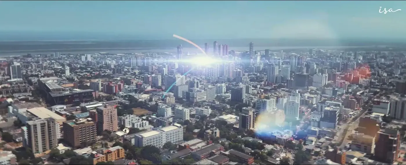 Ciudad vista desde el aire con un destello de luz sobre los edificios